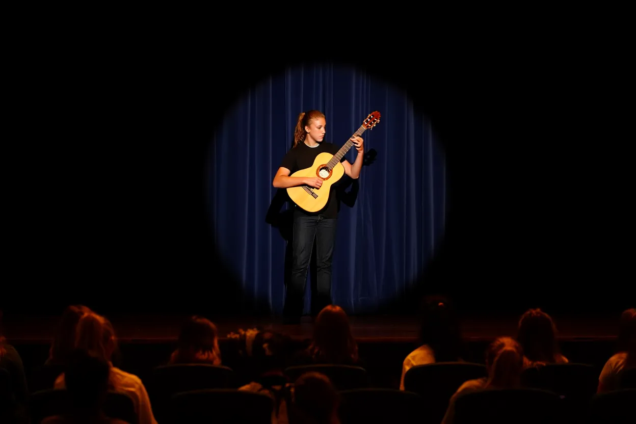 Student performing on stage